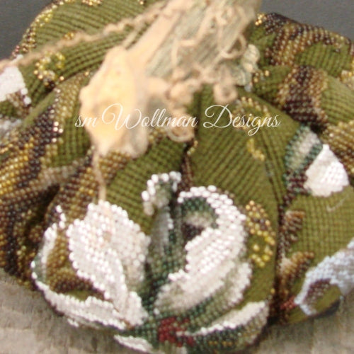 Dazzling Beads on Deep Pine
